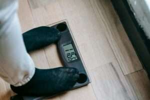 a person standing on a smart scales 