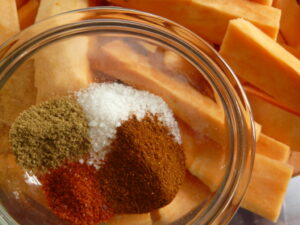 Cumin, chili powder, and paprika spices for quinoa stuffed bell peppers recipe