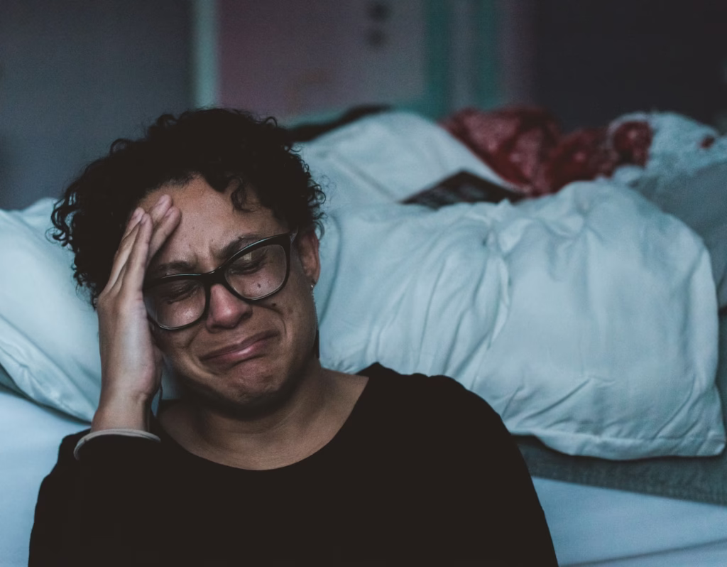 person crying beside bed -The 3am Problem — What You Need To Know